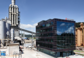 Meyer Burger: Liefert bunte Module für Solarfassade von neuem Swiss Krono Bürogebäude